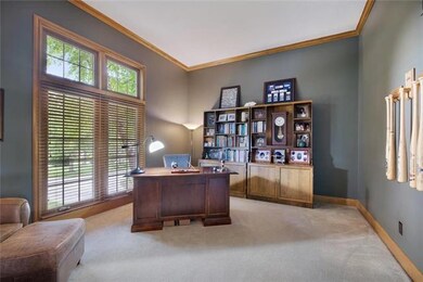 The natural light and warm tones of this home offi