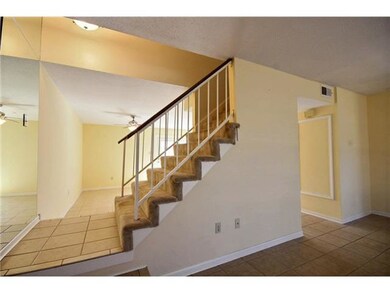 Mirrored wall at stairs.