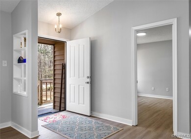 View of NEW LVP floored entrance foyer
