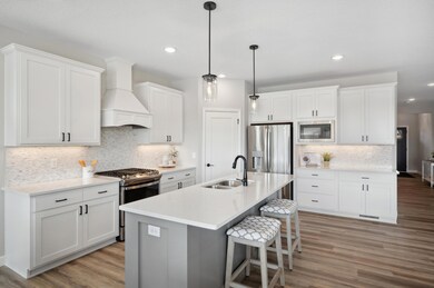Kitchen - image is of a former model home for visual purposes.
