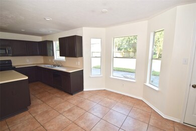 5902 Cascadera Dr, Houston, TX 77086 - photo 6