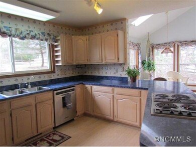 Kitchen opens to sunroom