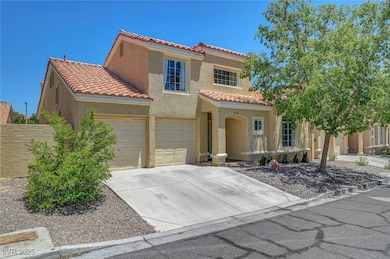 Mediterranean / spanish home with driveway, stucco