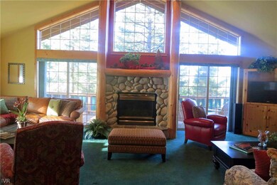Living Area with River Rock Gas Fireplace
