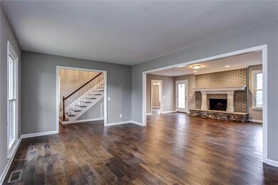 Great Open Living Rm/Den Setup. Plenty of Room to Spread Out. Front Room Could Be Used For Large Dining Room.