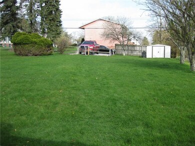 Back Yard With Shed And Off-Street Parking