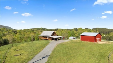 Nearly 5 acres of open beauty surrounded by mounta