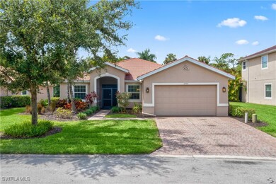View of front of property with a garage and a fron