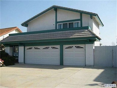 3 car garage with additional driveway parking and 