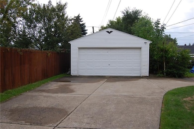 Newer 2 car garage with lots of extra parking and 