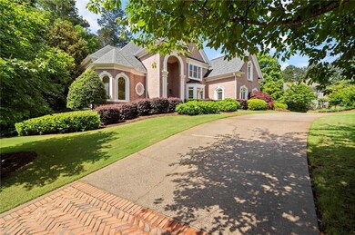 View of front of home with brick siding, a front l
