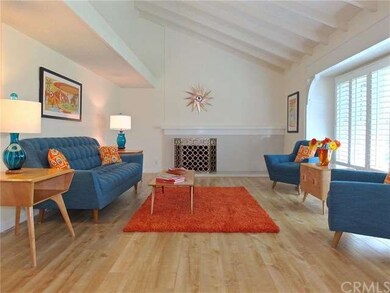 Welcoming Living Room w/ Cozy Fireplace & Vaulted 