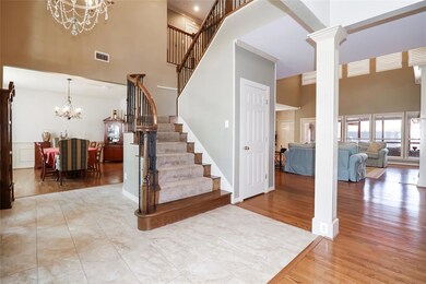 Open floorplan to the living and formal dining are