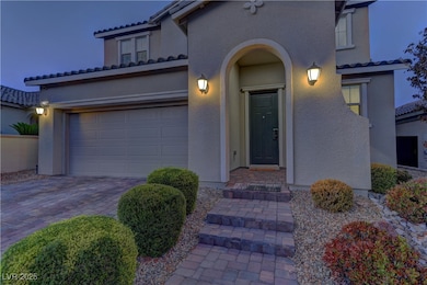 View of front facade with stucco siding, decorativ