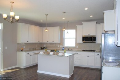 This spacious kitchen with stainless steel applian