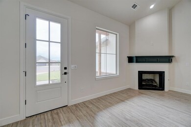 Doorway featuring light wood-type flooring