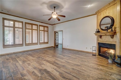 Main living area has wood like tile, custom planta