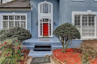 Traditional-style house with an attached garage, s