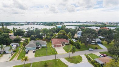 Aerial of house looking south at Dona Bay (high bu