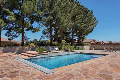 amazing flagstone deck around large pool and spa w