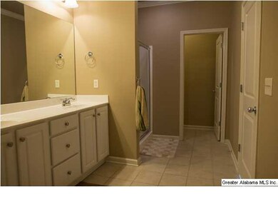 Master bath with double vanities, garden tub and s