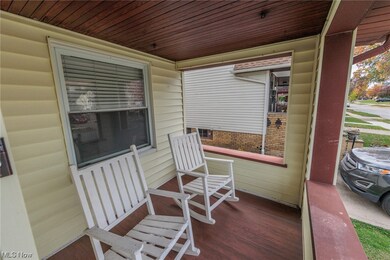 Enjoy the neighborhood while on your front porch.