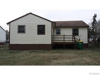 Rear View of Home with a Large Back Yard !