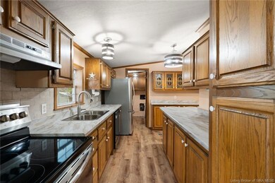 Abundance of Kitchen cabinets and counter space.