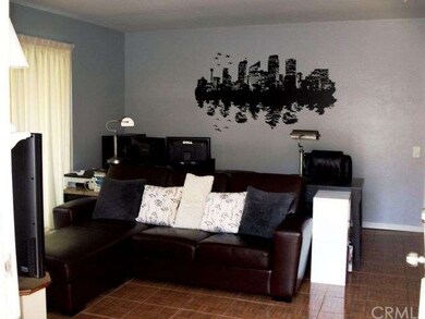 Living Room overlooks fireplace and opens to priva