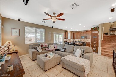 The living room is open to the kitchen so you can