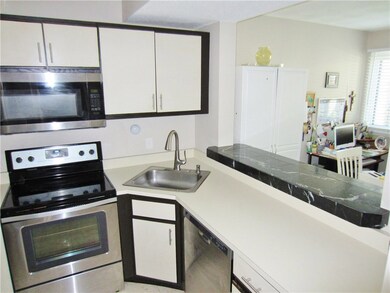 Kitchen is Also Open to the Dining room, with Brea