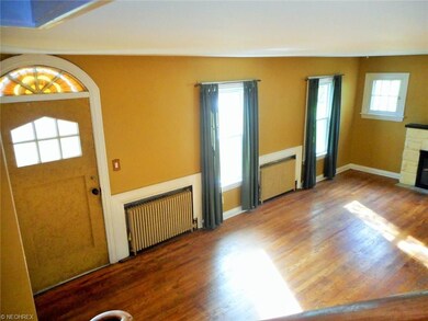 View from the stairwell down to the open living ro