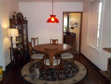 Dining room with refinished hardwood floors.