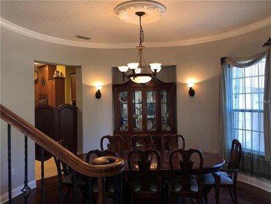 Dining room with saloon doors to kitchen