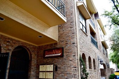 View of building exterior featuring a garage