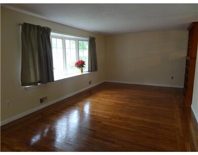 Living Room. nice hardwoos,  bay windows, lots of