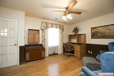 Formal Living Area offers hardwood floor, chair ra