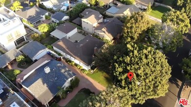 Excellent middle lot among small & large homes