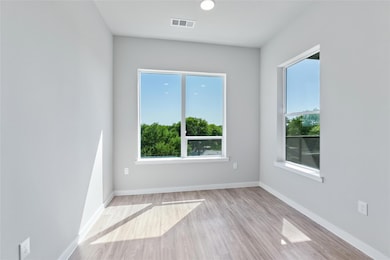 Spare room featuring plenty of natural light and 