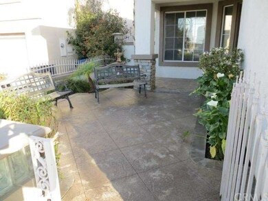 Relax and enjoy charming front patio, complete wit