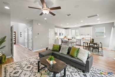 Open to the diningroom and kitchen. 15806 Celosia