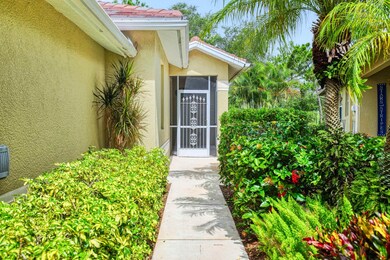 Doorway to property with stucco siding