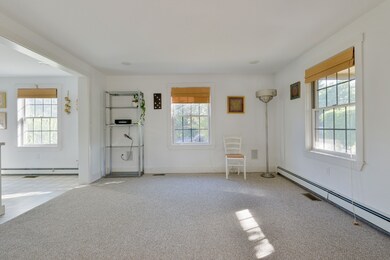 Open living and dining room.