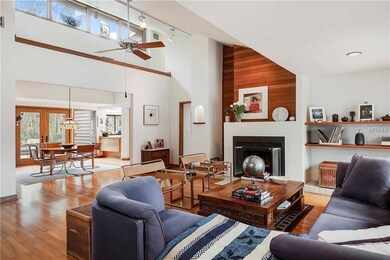 Soaring ceilings, lots of windows & a loft with ca