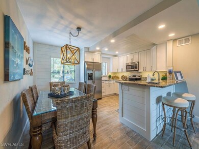 900 Misty Pines Cir unit 203, Naples, FL 34105 - photo 2