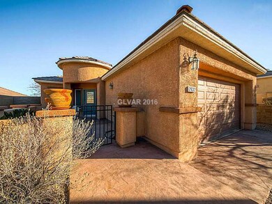 Property Photo. Front of home looking into courtya