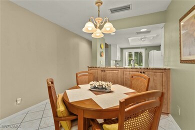 Dining area featuring a chandelier, visible vents,