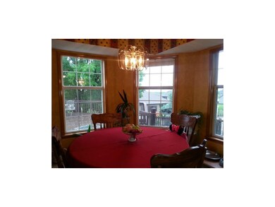 Decorative Dining Area has a view of the deck and 