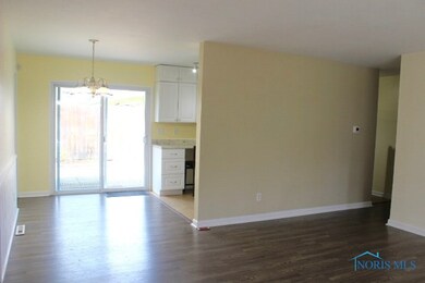 Living room open to dinning and the back yard area