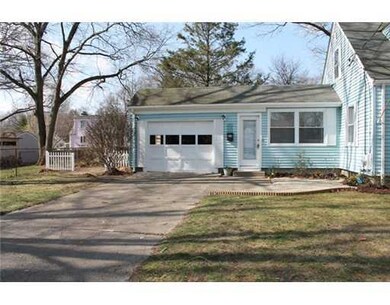 Exterior Front. Garage and driveway